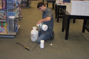 Carpet cleaning pre spray being mixed for commercial application