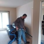 Rob our technician cleaning carpet